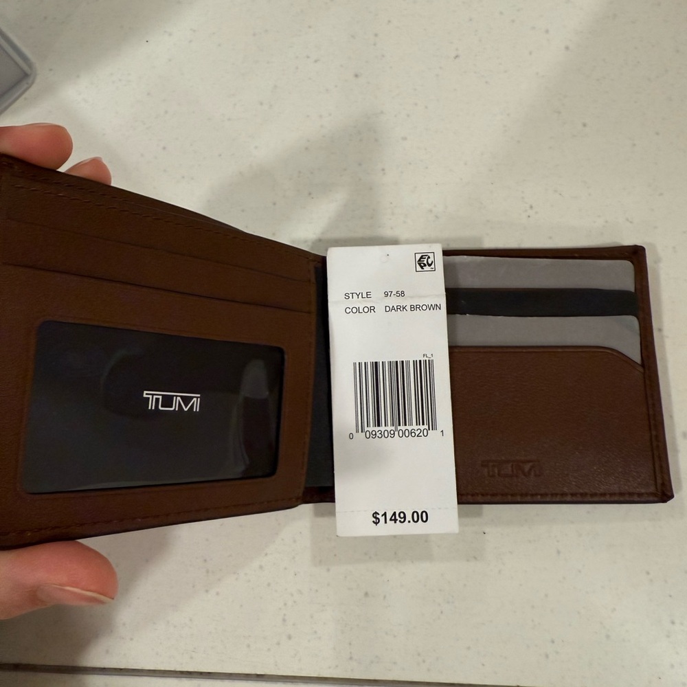 Tumi Dark Brown Leather folding wallet